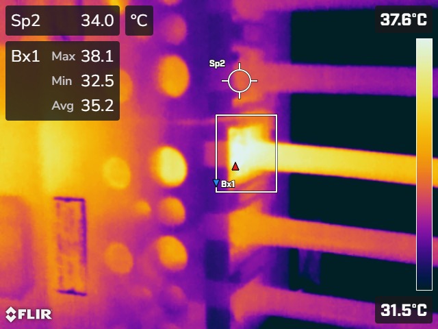 Thermal image of electrical panel connections, with one conductor termination showing as the warmest point